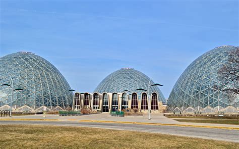 The domes - Feb 23, 2022 · These greenhouse masterpieces were designed by architecturally-renowned Donald Grieb and opened in 1963. These Domes offer a fascinating look at three different climate zones, making it a popular destination for families and nature enthusiasts alike. Designed to be a horticultural educational resource for the city of Milwaukee, the Domes also ... 